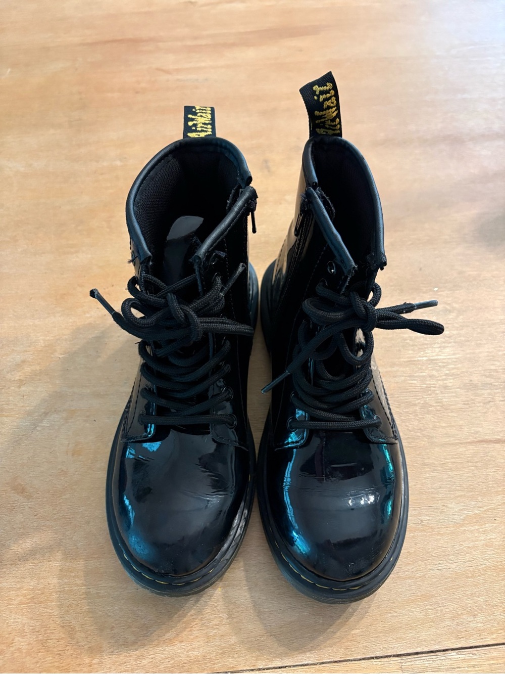 Dr. Martens Kids Black Patent Lace-Up Boots with Yellow Heel Loop